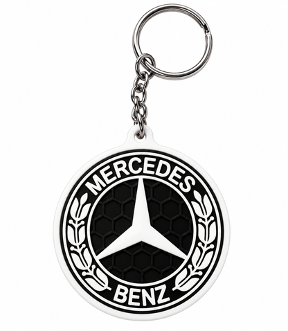 Privjesak za ključeve s okruglim crno-bijelim Mercedes-Benz logotipom, reljefnim uzorkom saća i metalnim lancem i prstenom